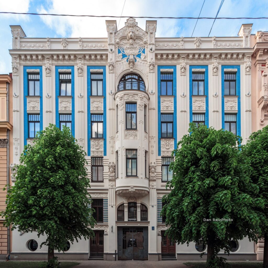 The iconic blue and white Art Nouveau facade of Alberta 8 in Riga, designed by Mikhail Eisenstein